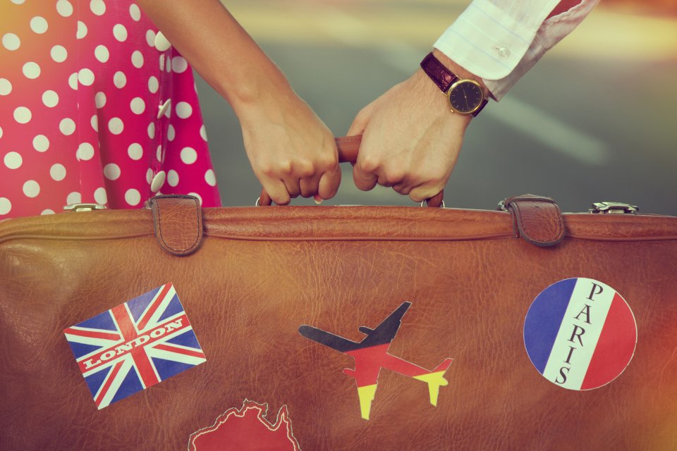 Zo voorkom je bagagediefstal: plak geen vlag op je koffer. Foto: Getty Images