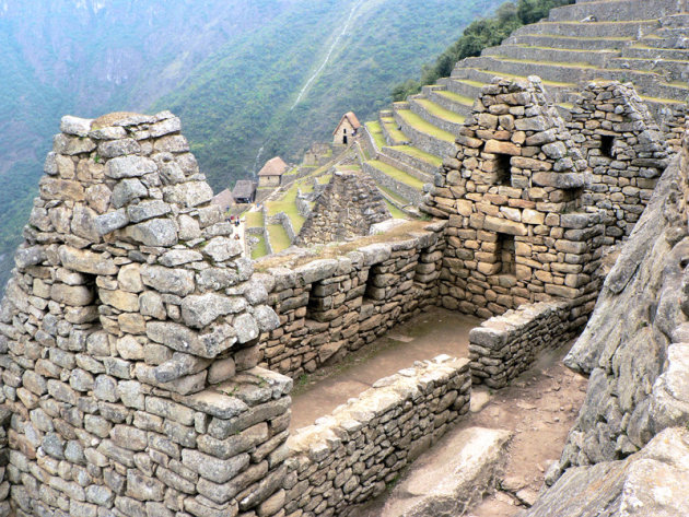 Machu Picchu: uitzicht op de wachtershuisjes