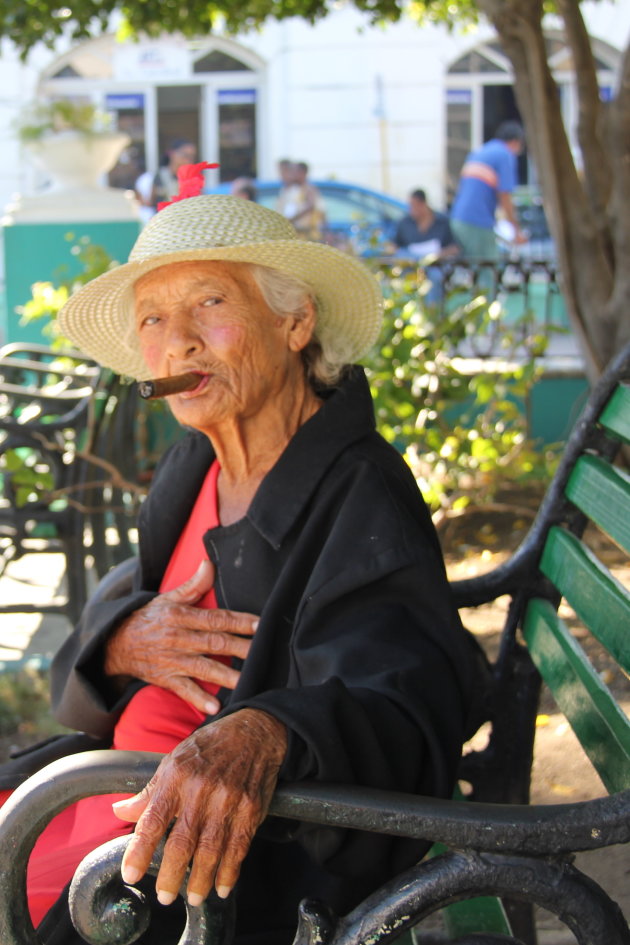 Lady smoking her sigar