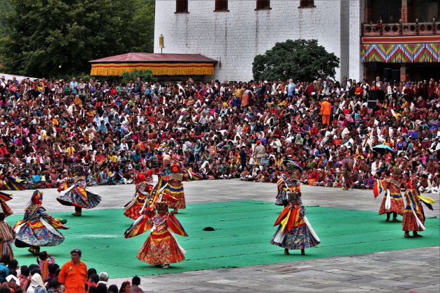 het bijwonen van het Tshechu festival