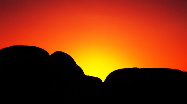 Zonsopkomst bij de Devils Marbles