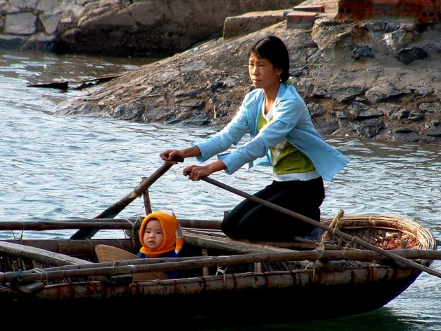 Moeder en kind op de Mekong