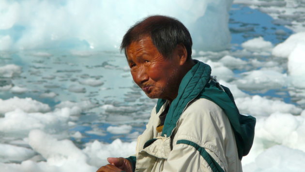 visser bij de haven van IIlulissat