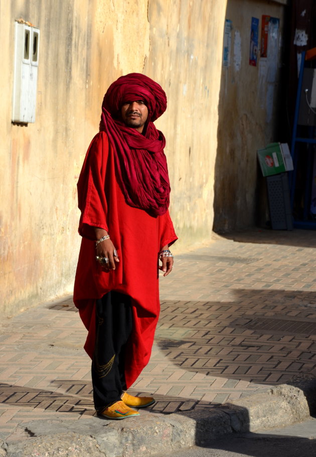 Man in het rood.