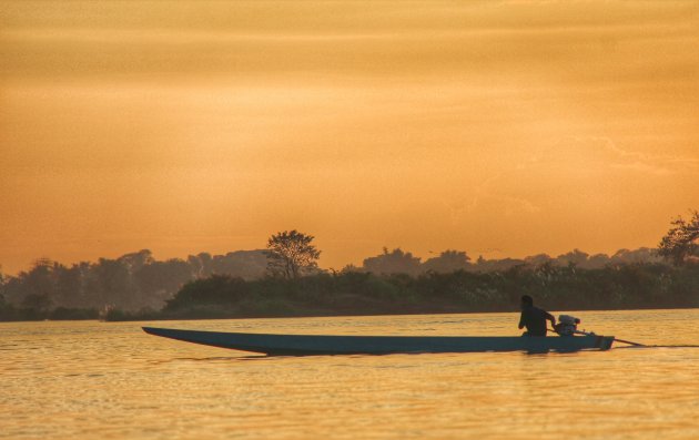 Zonsondergang op de Mekong