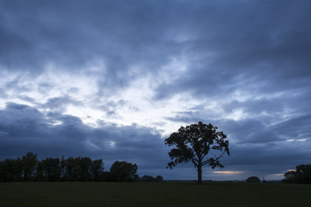 Regenachtige zonsondergang