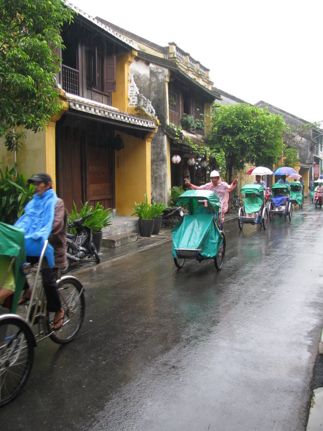 Cyclo in de regen