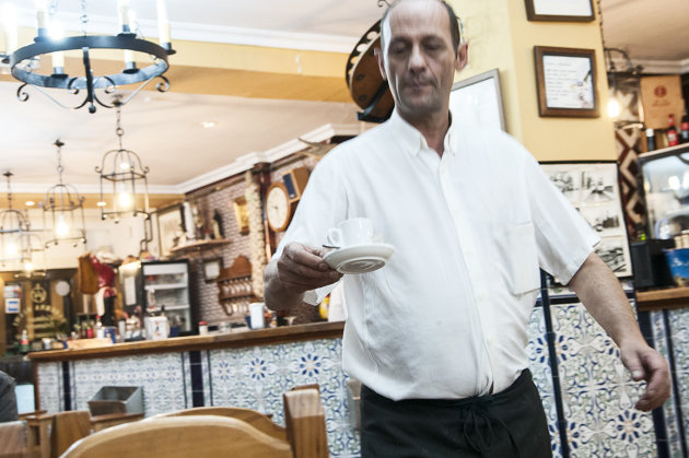 Espresso na het eten in een restaurantje in wijk Triana in Sevilla