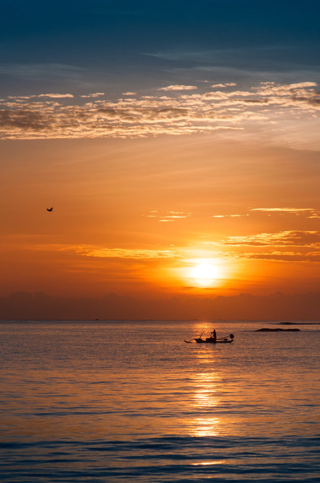 Vissen bij zonsondergang