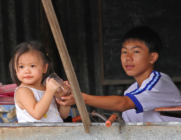 Behulpzame broer Mekong Delta