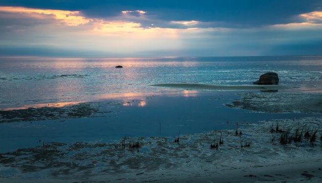 Een zonsondergang om bij weg te dromen