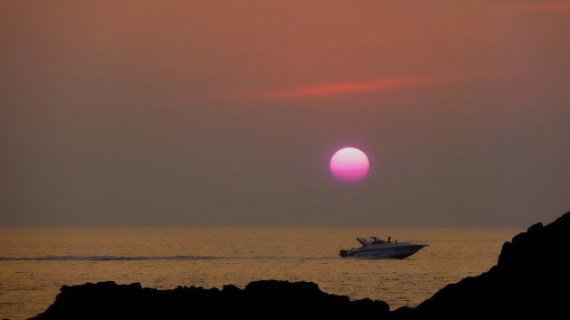 Zon in de zee  zien zakken