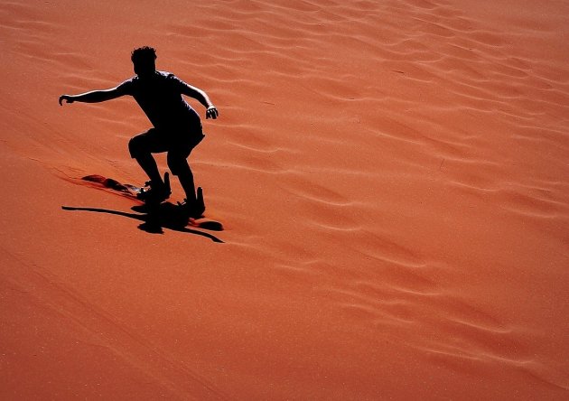 Sandboarden in de Wadi Rum